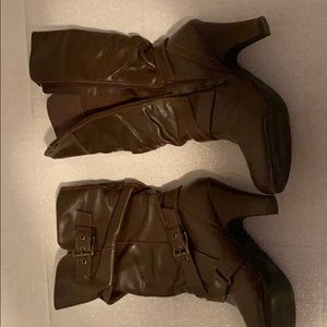 Brown heeled boots.